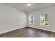 Bedroom with hardwood floors and view of neighborhood at 5206 Cottage Lndg Dr, Summerville, SC 29485