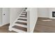 Staircase featuring hardwood treads and white risers at 5206 Cottage Lndg Dr, Summerville, SC 29485
