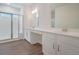 Bathroom features a glass shower, dual sinks, and a vanity area with lots of natural light at 5213 Cottage Lndg Dr, Summerville, SC 29485