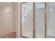A glass shower featuring subway tile and stainless steel fixtures and a peek into the closet at 5213 Cottage Lndg Dr, Summerville, SC 29485