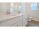 Bright bathroom featuring dual sinks, quartz countertops, and shaker cabinets at 5213 Cottage Lndg Dr, Summerville, SC 29485
