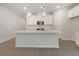 A spacious kitchen features a center island with pendant lighting and ample counter space at 5213 Cottage Lndg Dr, Summerville, SC 29485