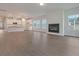 Bright and open living space with hardwood floors, fireplace, and seamless kitchen access at 5213 Cottage Lndg Dr, Summerville, SC 29485
