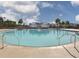 Resort-style pool area features crystal-clear water and inviting lounge areas for relaxation at 5213 Cottage Lndg Dr, Summerville, SC 29485