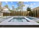 Luxurious swimming pool and spa area featuring a modern design, perfect for relaxation and recreation at 71 Moultrie St, Charleston, SC 29403