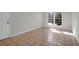 Bedroom featuring tile floors, fresh paint, and a view of community at 867 Colony Dr # F-82, Charleston, SC 29407