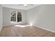 Clean bedroom with tile flooring, neutral paint, window, and ceiling fan at 867 Colony Dr # F-82, Charleston, SC 29407