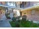 Picturesque courtyard with lush landscaping and walkways, creating an inviting outdoor space for relaxation at 867 Colony Dr # F-82, Charleston, SC 29407