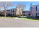 Exterior view of the brick apartment complex with mature trees and landscaped yards, offering a welcoming neighborhood feel at 867 Colony Dr # F-82, Charleston, SC 29407