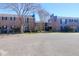 Beautifully maintained brick complex with mature trees and landscaped lawns, showcasing a peaceful residential community at 867 Colony Dr # F-82, Charleston, SC 29407