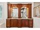 Bathroom showcasing a large double vanity with custom cherry wood cabinetry, granite counters, and modern fixtures at 935 Royall Ave, Mount Pleasant, SC 29464