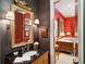 Stylish bathroom with a dark wall, ornate mirror, granite countertop, and access to a cozy adjacent room at 935 Royall Ave, Mount Pleasant, SC 29464