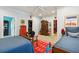 Inviting bedroom with blue bedding, bright rug, two beds and ample room for furnishings at 935 Royall Ave, Mount Pleasant, SC 29464