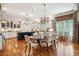 Open kitchen and dining area with a center island, pendant lighting, and ample cabinetry at 935 Royall Ave, Mount Pleasant, SC 29464