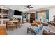 Inviting living room with a fireplace, built-in bookshelves, and comfortable seating arrangement at 935 Royall Ave, Mount Pleasant, SC 29464