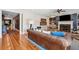 Spacious living room with hardwood floors, a fireplace, and comfortable seating at 935 Royall Ave, Mount Pleasant, SC 29464