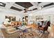 Open-concept living room and kitchen with hardwood floors and elegant decor at 935 Royall Ave, Mount Pleasant, SC 29464