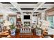 Elegant living room featuring coffered ceilings, a fireplace, and stylish decor at 935 Royall Ave, Mount Pleasant, SC 29464