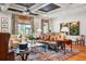 Bright living room with a comfortable sofa, decorative pillows, and floral artwork at 935 Royall Ave, Mount Pleasant, SC 29464
