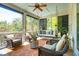 Relaxing porch showcasing comfortable seating and porch swing for enjoying outdoor living at 935 Royall Ave, Mount Pleasant, SC 29464