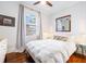 Bright bedroom with hardwood floors, window, and stylish decor at 1 Percy St, Charleston, SC 29403
