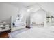 Bright bedroom featuring built-in window seats and shelving for cozy, functional storage at 1 Percy St, Charleston, SC 29403