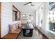 Cozy dining room with a view into the kitchen and natural light at 1 Percy St, Charleston, SC 29403