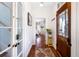 Inviting entryway with hardwood floors and charming details, leading to a beautifully decorated home at 1 Percy St, Charleston, SC 29403