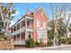 Charming two-story home with a spacious porch and bay window at 1 Percy St, Charleston, SC 29403