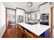 Modern kitchen island with marble countertop and stainless steel range at 1 Percy St, Charleston, SC 29403