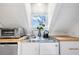 Compact kitchenette featuring modern appliances and ample counter space at 1 Percy St, Charleston, SC 29403