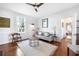 Cozy living room with natural light and hardwood floors at 1 Percy St, Charleston, SC 29403