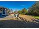 Expansive backyard with a patio, seating, and ample green space at 101 Back Creek Ct, Summerville, SC 29485