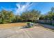 Large backyard featuring a concrete patio with a table and chairs at 101 Back Creek Ct, Summerville, SC 29485