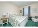 Comfortable bedroom featuring a queen bed, green carpet, and natural light from the window at 101 Back Creek Ct, Summerville, SC 29485