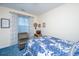 Inviting bedroom with blue carpet, accent chair, and natural light at 101 Back Creek Ct, Summerville, SC 29485