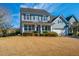 Charming two-story home with an inviting front porch and well-maintained landscaping at 101 Back Creek Ct, Summerville, SC 29485