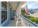 Charming front porch with American flag and view of the neighborhood at 101 Back Creek Ct, Summerville, SC 29485