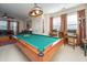 Spacious game room featuring a pool table, carpet, and comfortable seating at 101 Back Creek Ct, Summerville, SC 29485