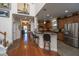 A modern eat-in kitchen features stainless steel appliances and warm wood cabinets at 101 Back Creek Ct, Summerville, SC 29485
