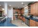 The kitchen has stainless appliances, wooden cabinets, and a functional layout for cooking and storage at 101 Back Creek Ct, Summerville, SC 29485