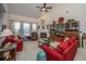 Comfortable living room with vaulted ceiling, ceiling fan, and a fireplace at 101 Back Creek Ct, Summerville, SC 29485