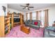Inviting living room featuring plush gray sofas, wood furnishings, and a ceiling fan at 101 Back Creek Ct, Summerville, SC 29485