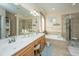 Elegant main bathroom with double sinks, a large mirror, and a separate shower and tub at 101 Back Creek Ct, Summerville, SC 29485