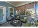 Inviting screened porch with comfortable seating and view of lush backyard at 101 Back Creek Ct, Summerville, SC 29485