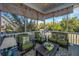 Relaxing screened porch with comfortable seating, providing a serene outdoor living space at 101 Back Creek Ct, Summerville, SC 29485