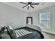 Bright bedroom features a ceiling fan, and a decorative full length mirror at 1028 Island Preserve Rd, Johns Island, SC 29455