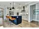 Stylish kitchen featuring a central island, stainless steel appliances, and modern pendant lighting at 1028 Island Preserve Rd, Johns Island, SC 29455