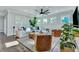 Bright living room with comfortable seating, stylish decor, and large windows at 1028 Island Preserve Rd, Johns Island, SC 29455