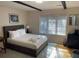 Inviting bedroom with a comfortable bed, large window, and stylish decor for a peaceful retreat at 104 Legend Oaks Way, Summerville, SC 29485